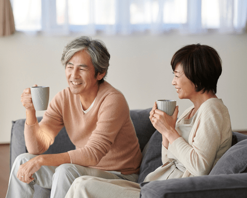man and woman drinking coffee